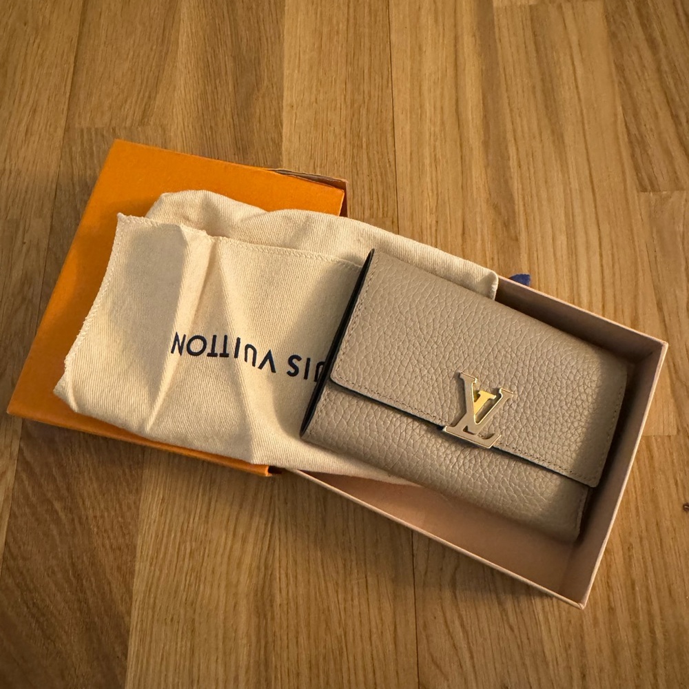 Louis Vuitton Cream Leather Wallet with Gold Hardware